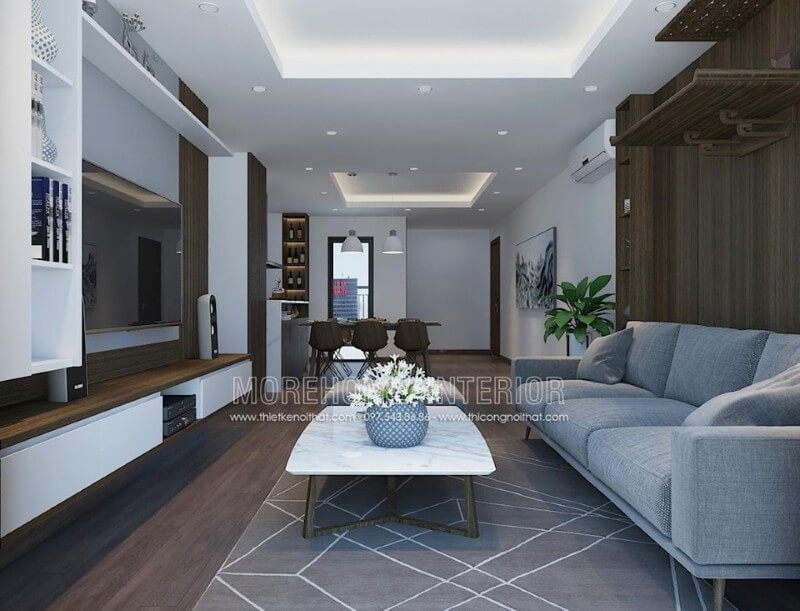 Ghế sofa vải màu xanh trẻ trung là một yếu tố đặc biệt để làm nổi bật không gian phòng khách.