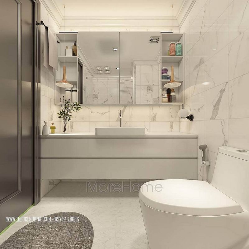 Phòng WC được thiết kế với phong cách sang trọng, sử dụng màu đá nhân tạo trắng kết hợp với vách kính cường lực 180 độ. Bàn rửa mặt kết hợp với kệ đựng đồ giúp tạo nên không gian sạch sẽ, hiện đại và đa năng.